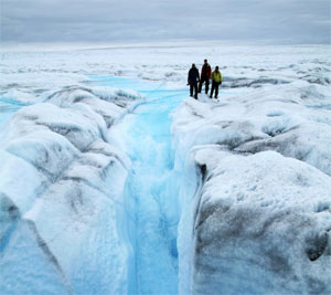 a very active moulin on the Semilik Glacier; Konrad Steffen + research team put cameras down moulins in 2007 to see what was happening inside the glacier's "pipe" system (photo Konrad Steffen, U Colorado)